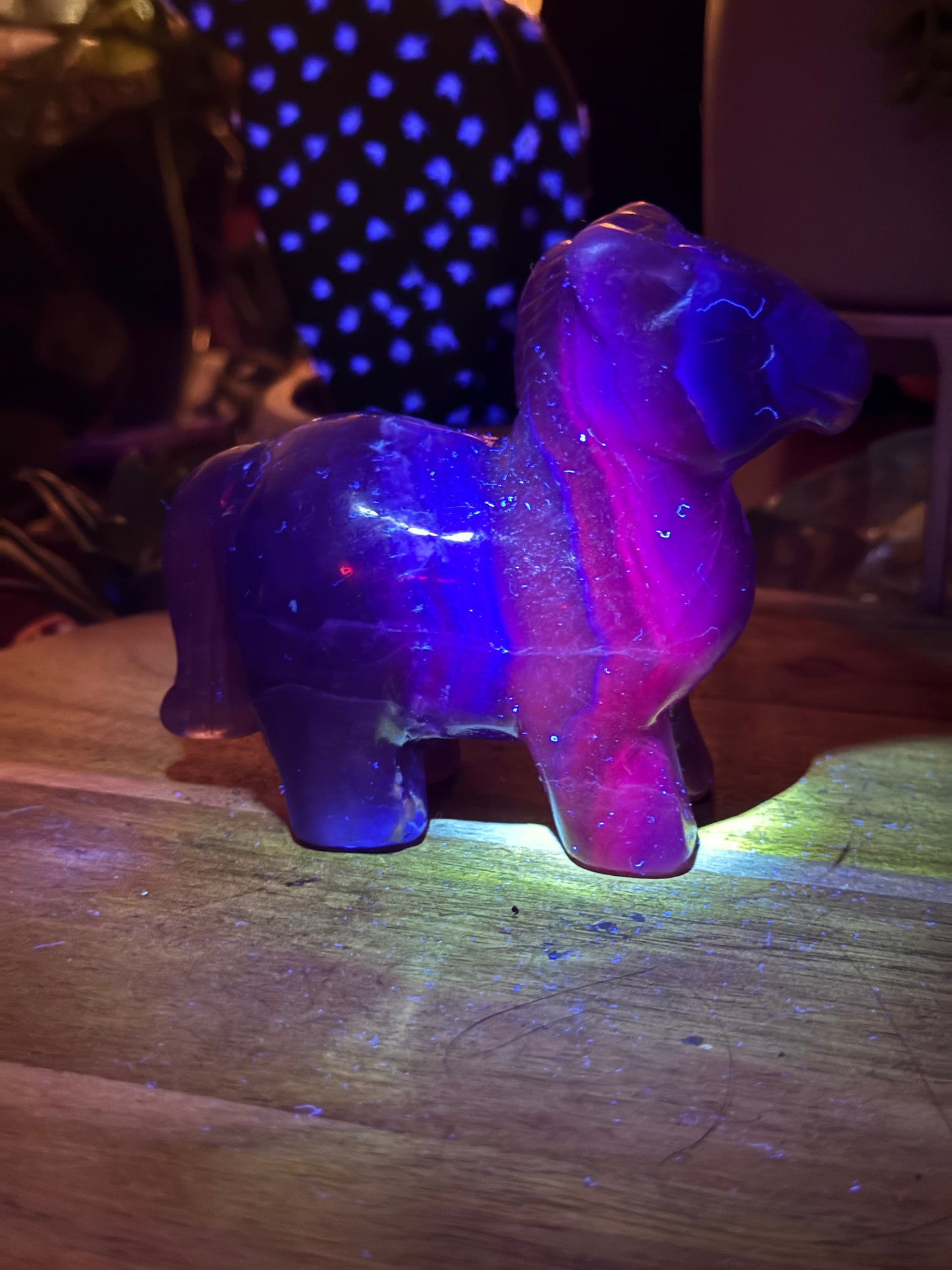 Fluorite horse with pink UV