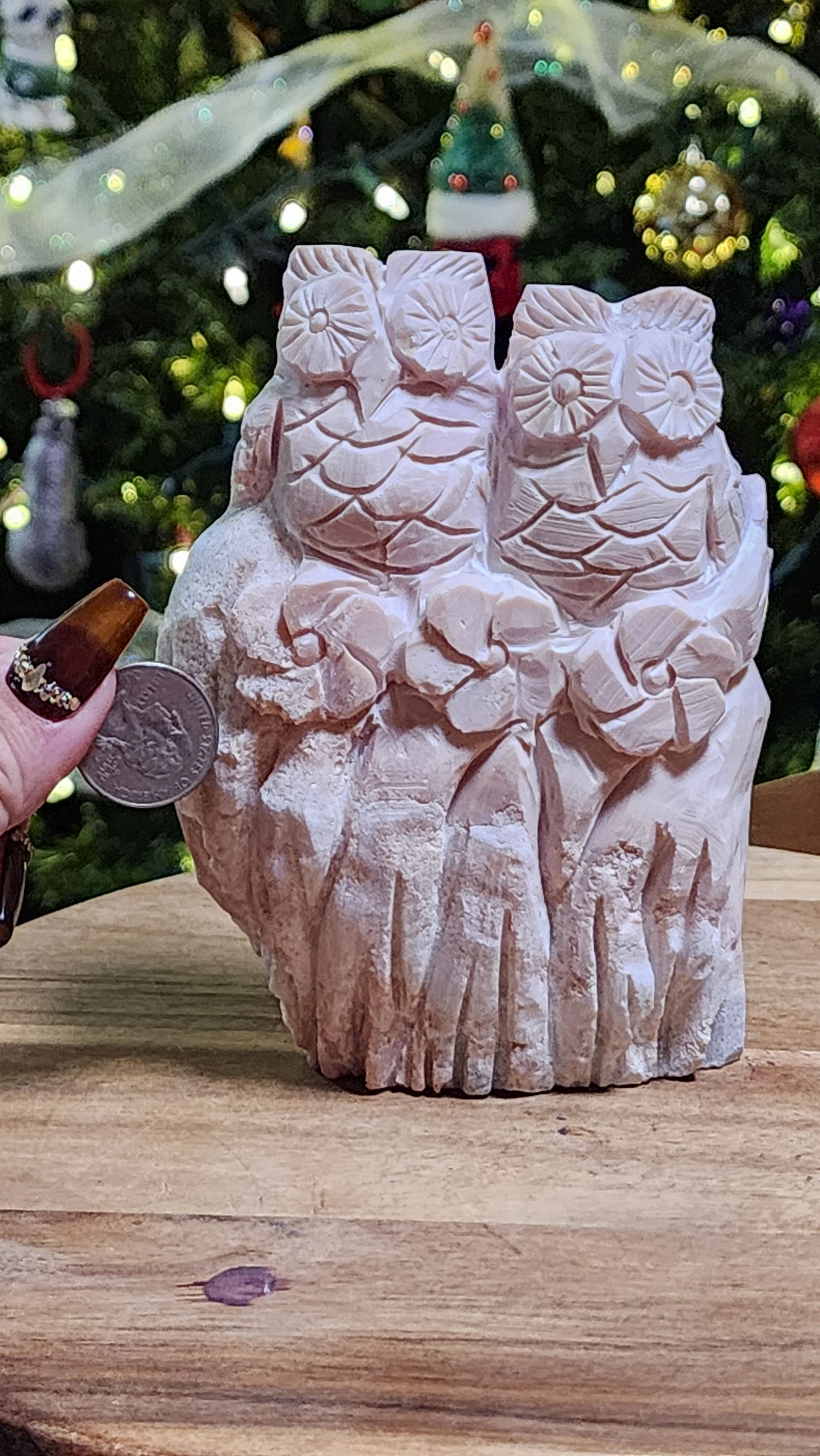 Pink opal owls carving