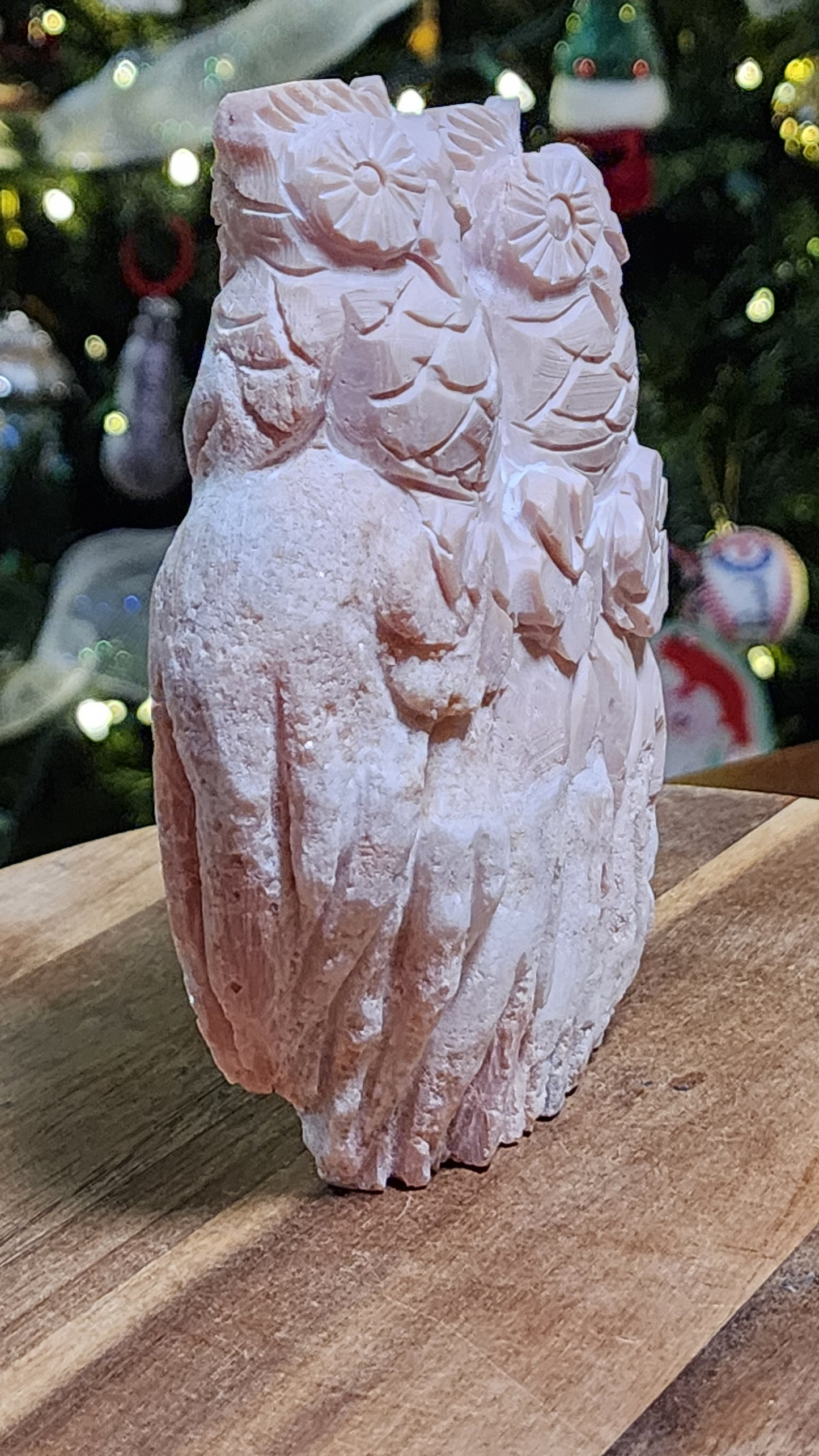 Pink opal owls carving