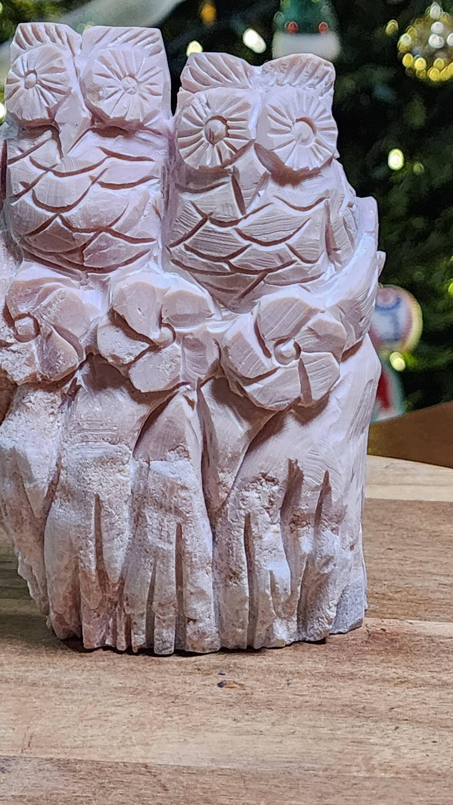 Pink opal owls carving