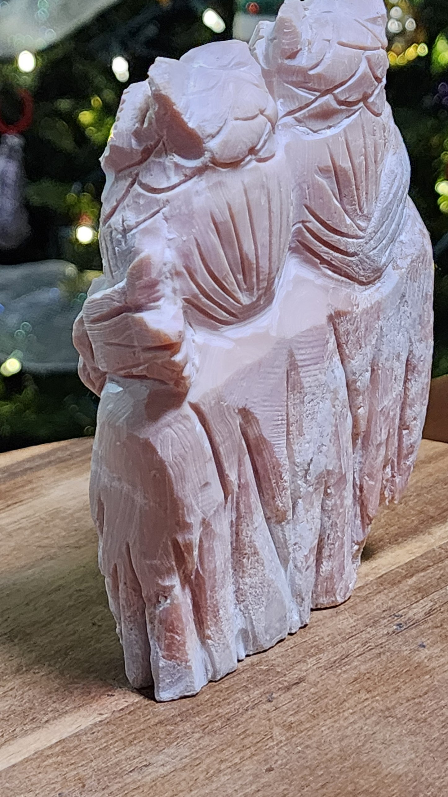 Pink opal owls carving