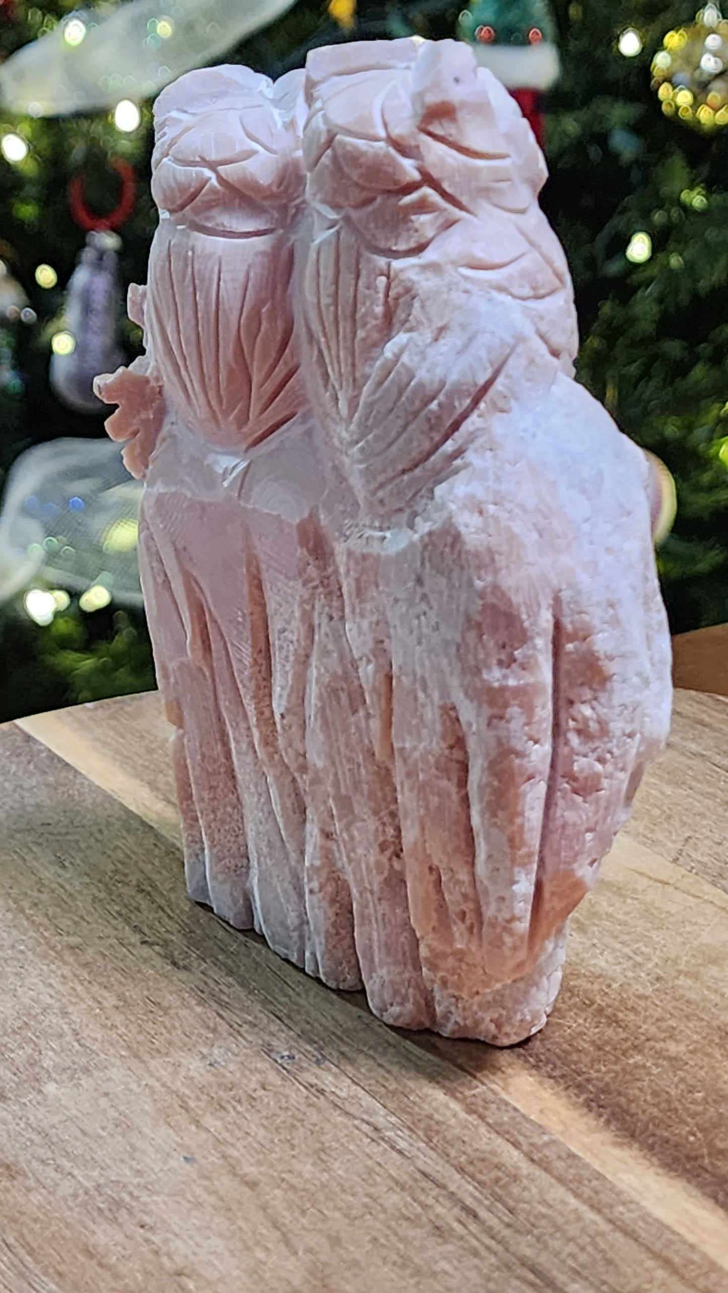 Pink opal owls carving