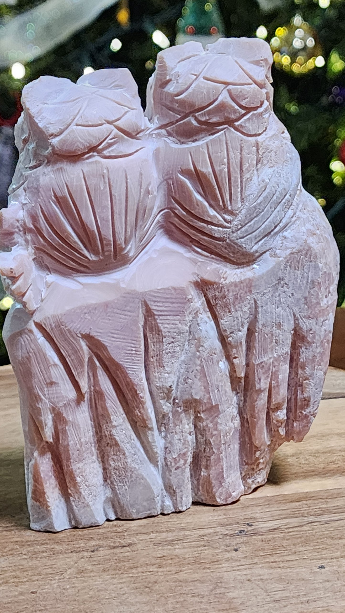 Pink opal owls carving