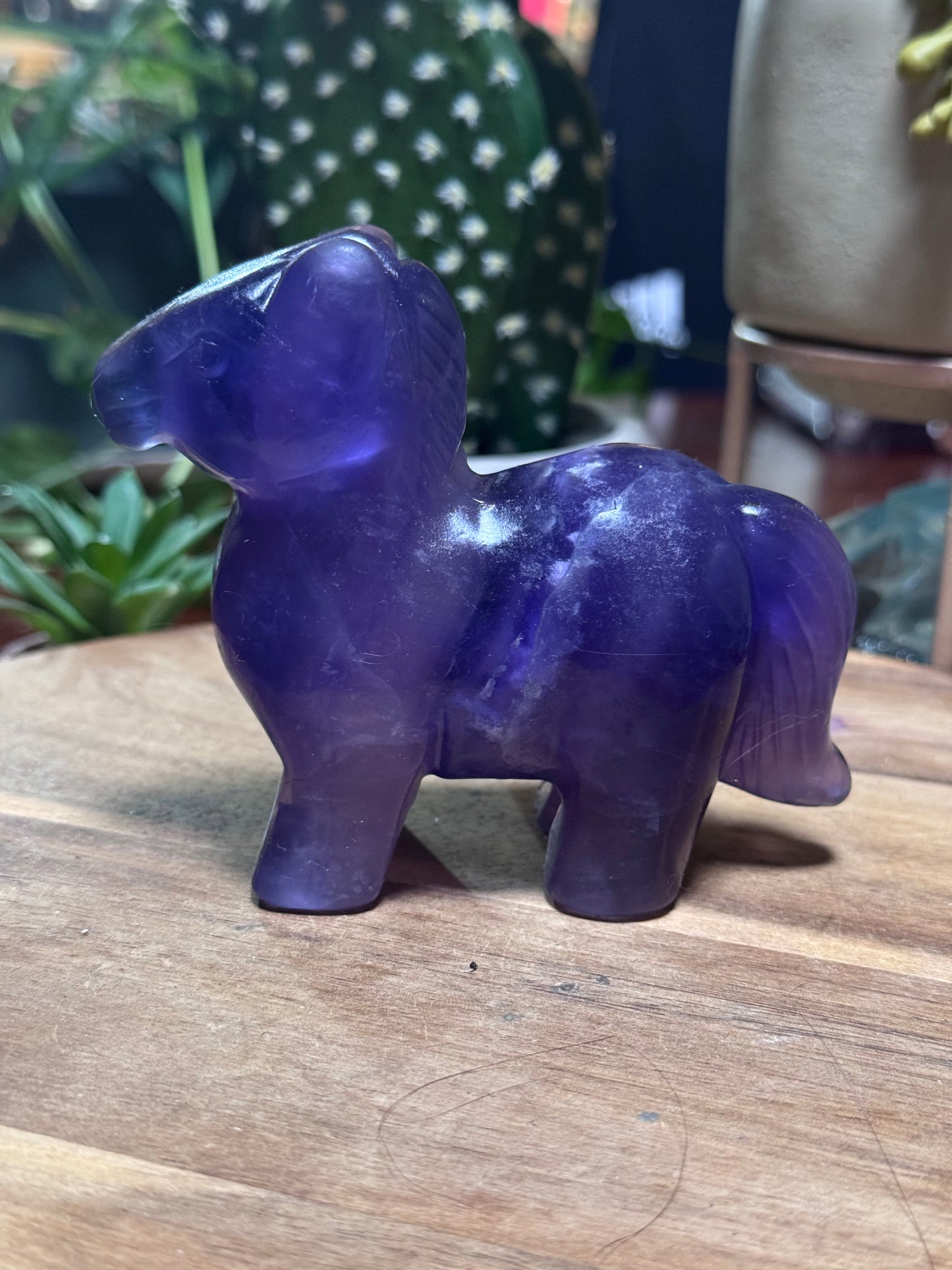 Fluorite horse with pink UV
