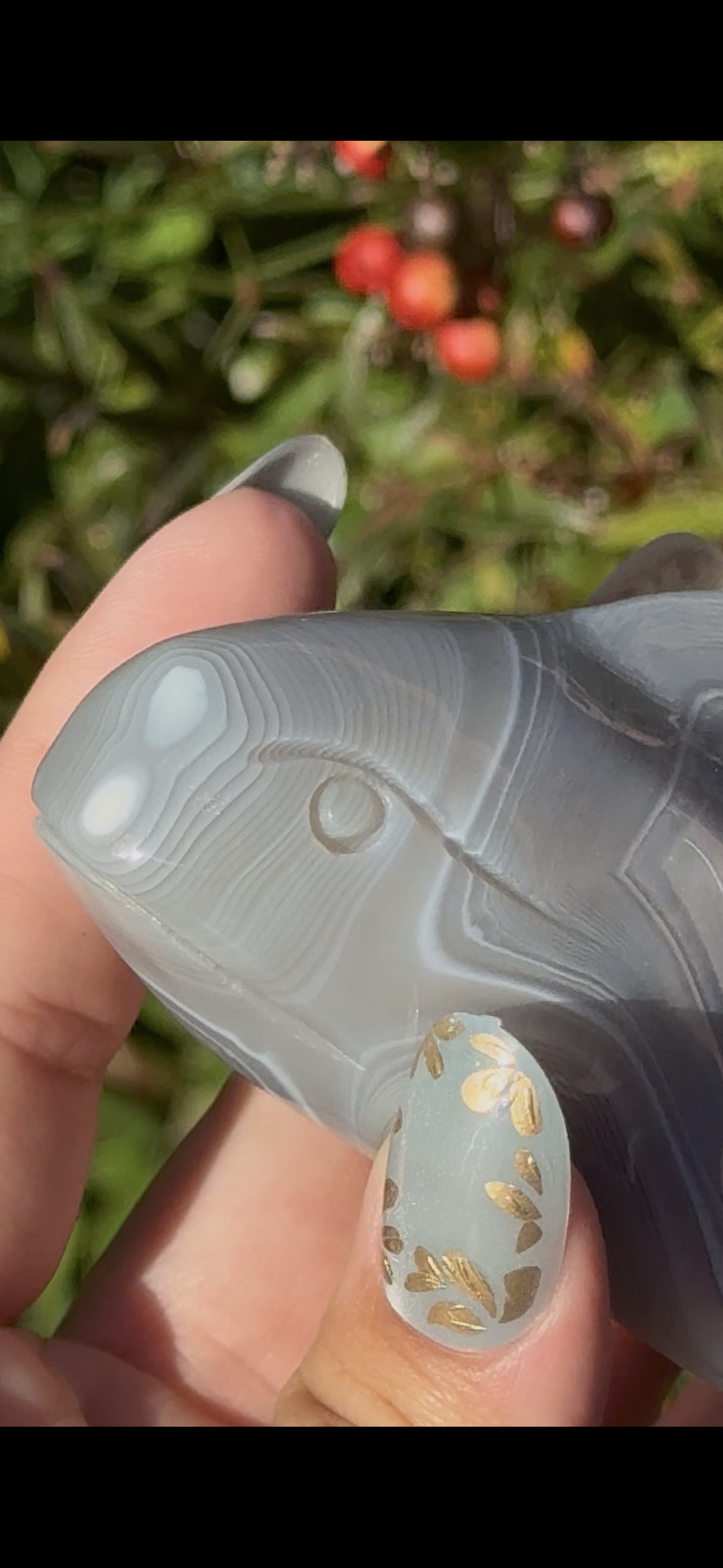 Banded agate whale carving