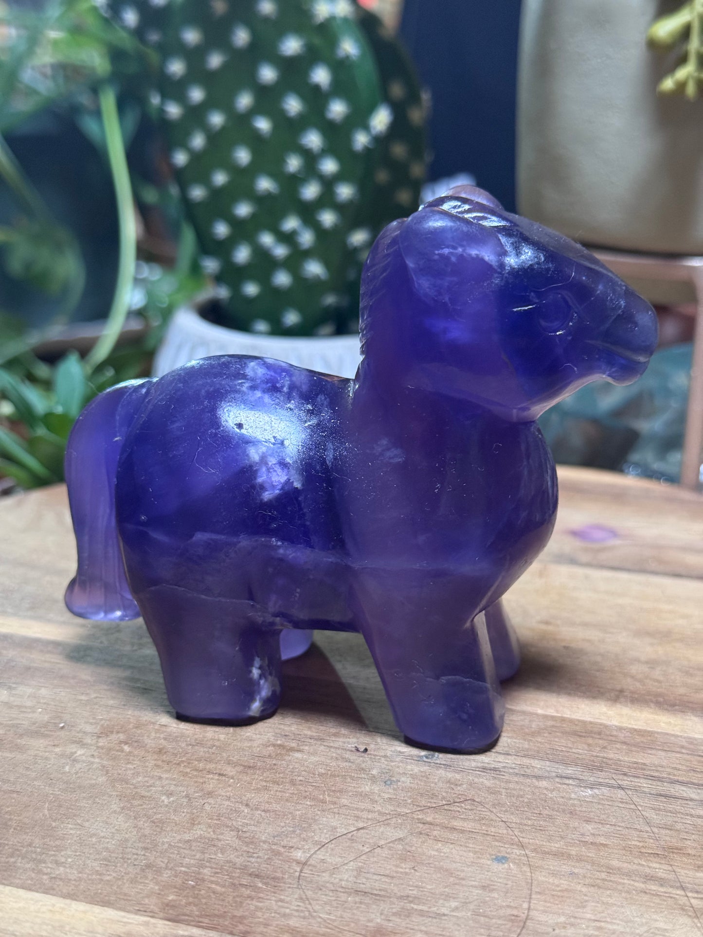 Fluorite horse with pink UV