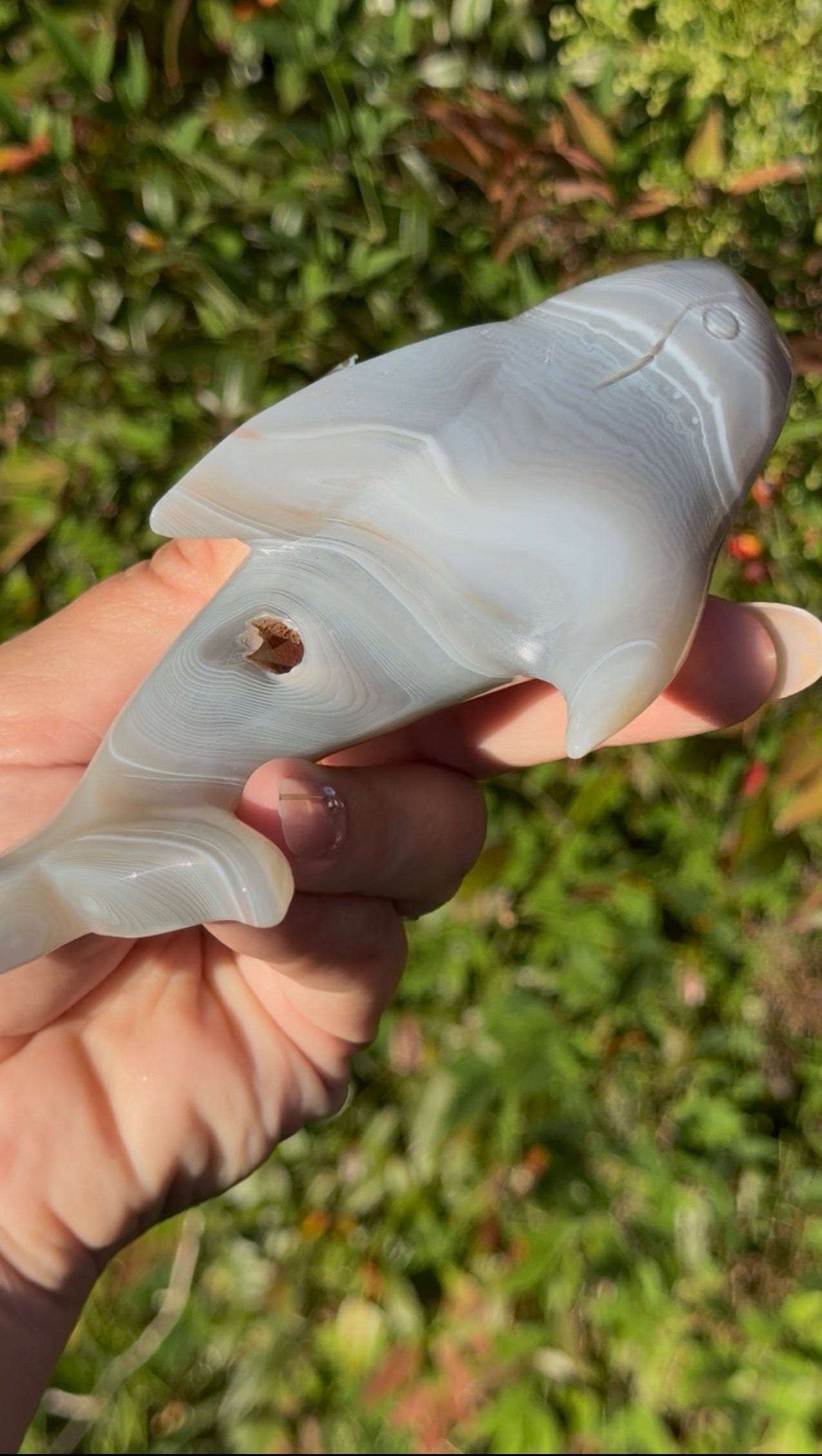 Banded agate whale carving