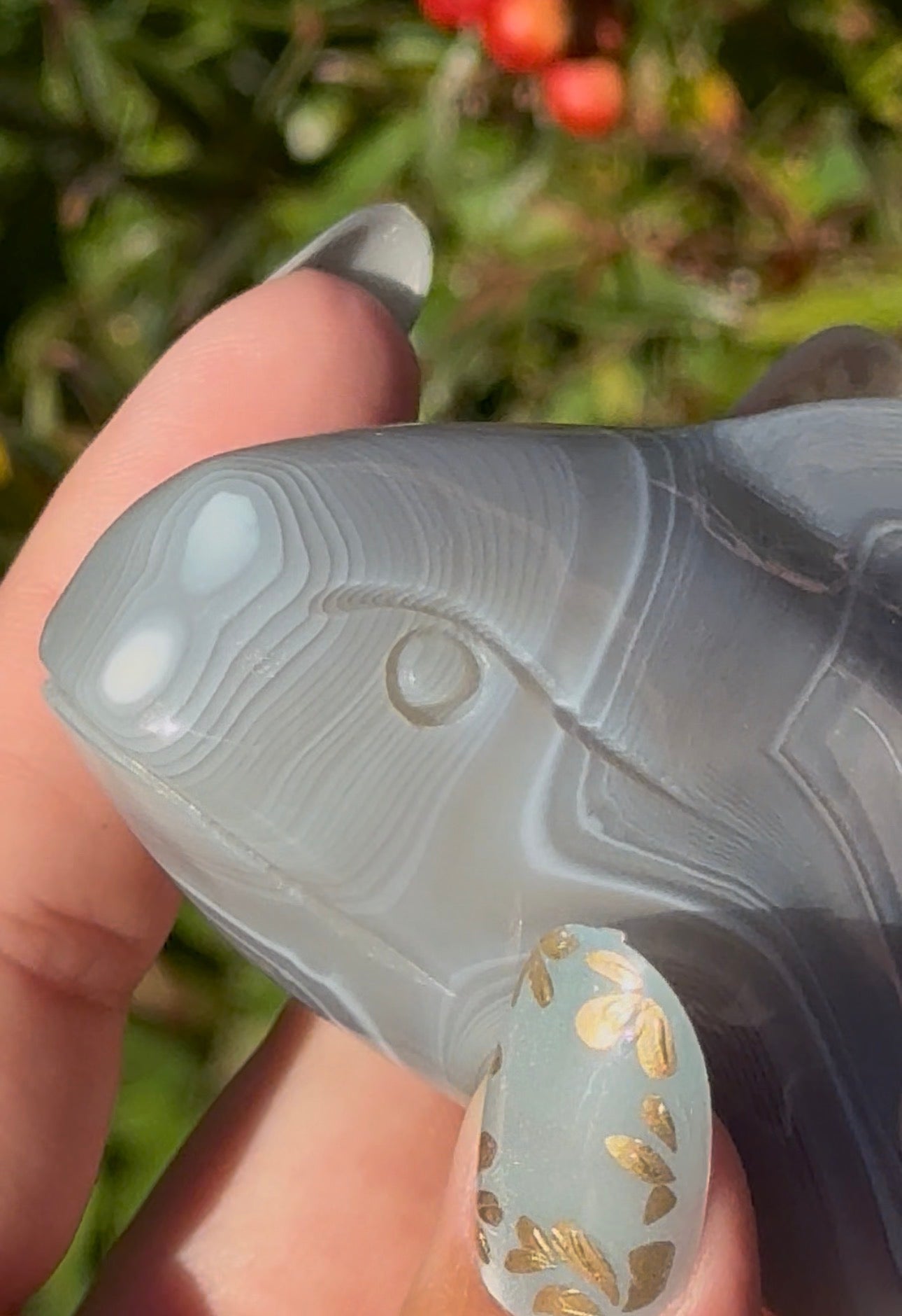 Banded agate whale carving