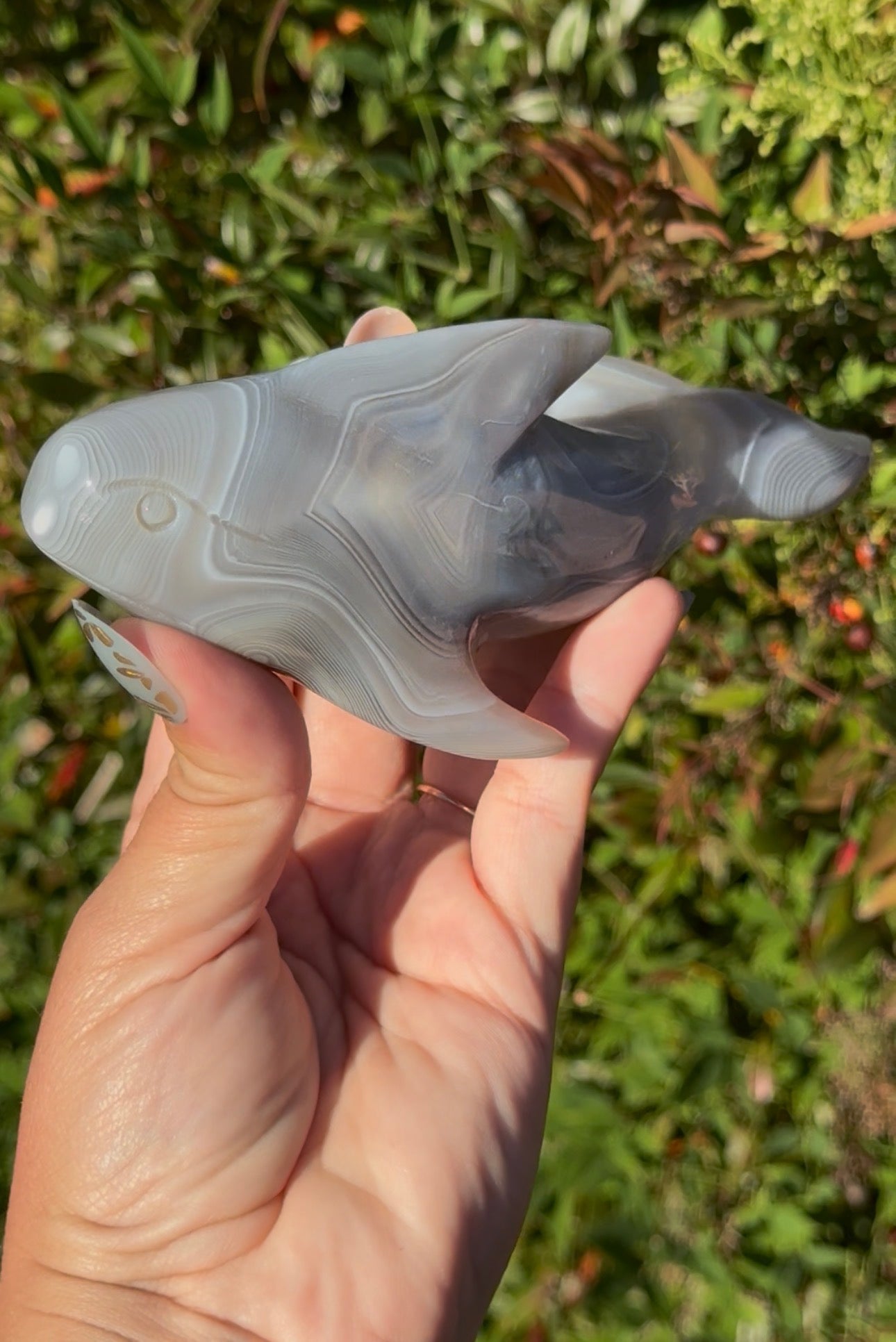 Banded agate whale carving