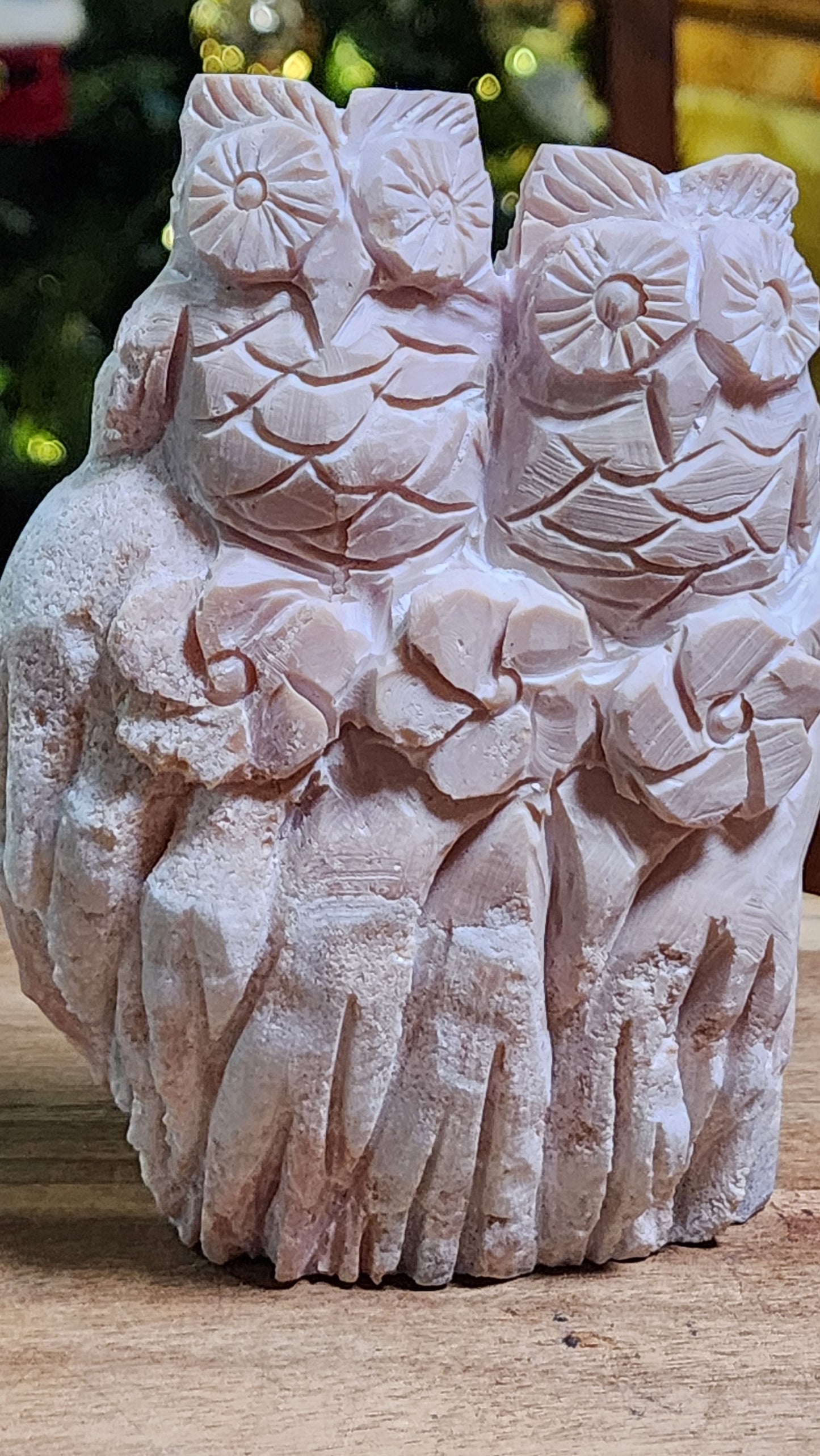 Pink opal owls carving